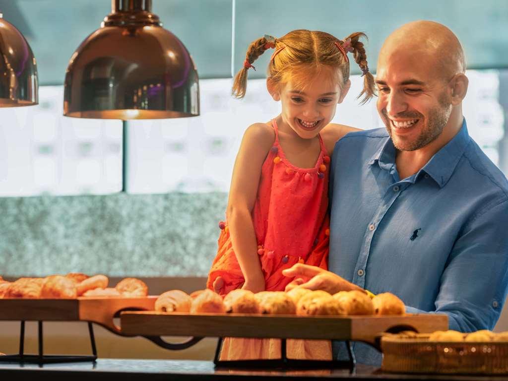 Ibis Styles Sharjah Hotell Restaurang bild